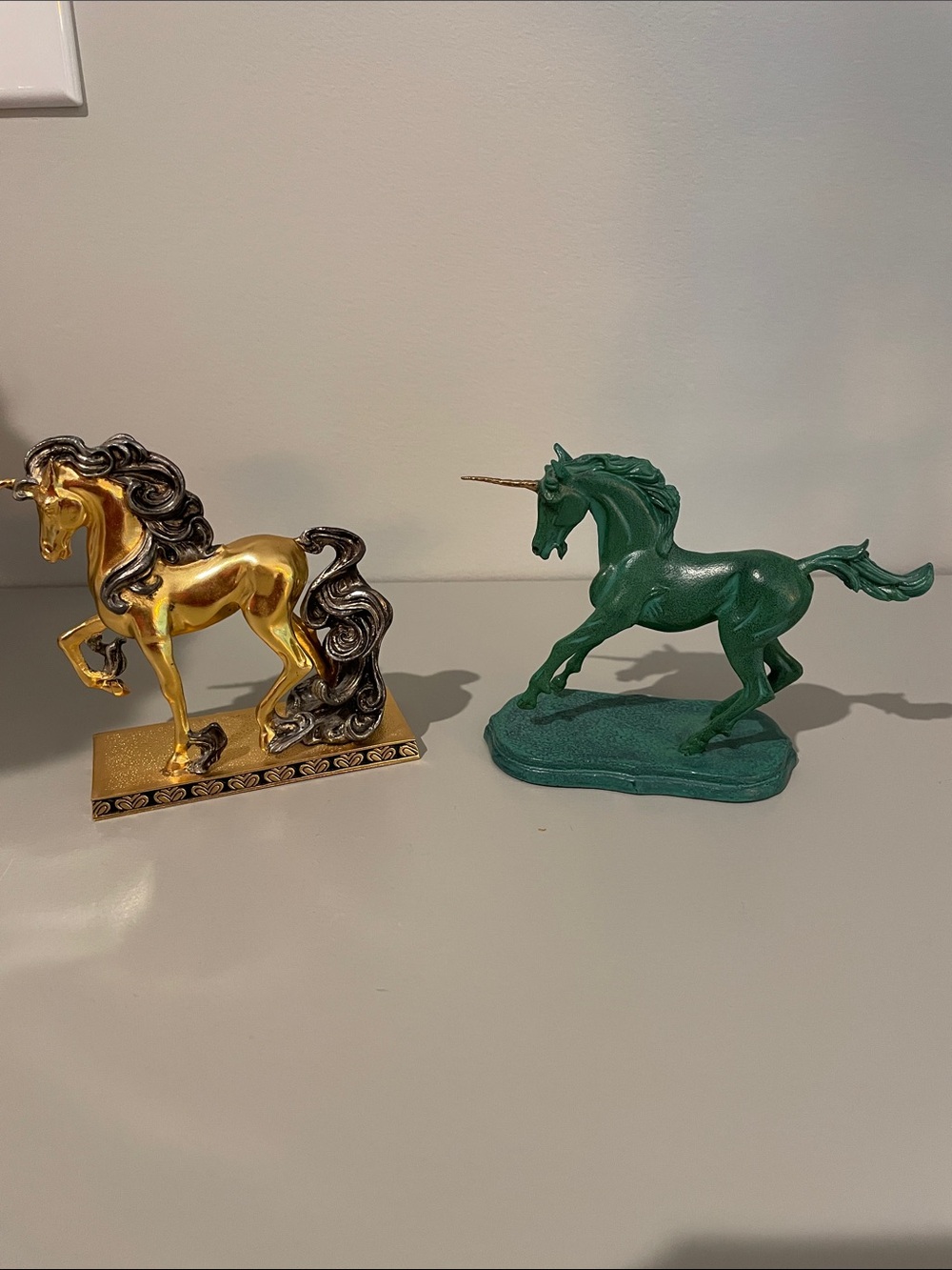A set of two Franklin mint unicorns from the 1991 collection